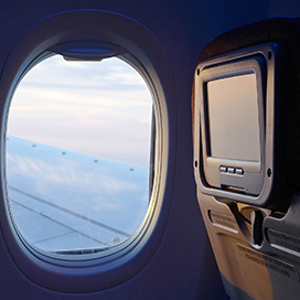 Why are an airplanes windows not aligned with the rows of seating?