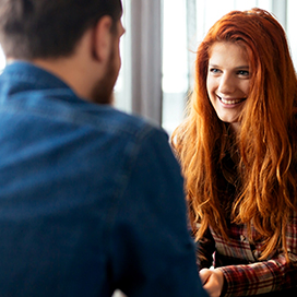 Why do men want to be with a girl when she shows less interest in them?