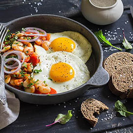 Baked Eggs in Popped Beans